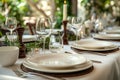 Candlelit Greenery-Adorned Table Setting with Crystal Wine Glasses