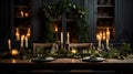 candlelit table with christmas candles in dark wood and darkened room,