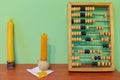 Candles and abacus, ancient Jewish symbols. Background with copy space