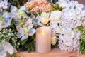 Candles and beautilful flowers. - Selective focus Royalty Free Stock Photo