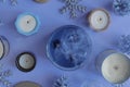 Candles on blue background. Christmas season Royalty Free Stock Photo