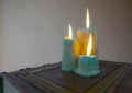 Candles on the book Royalty Free Stock Photo