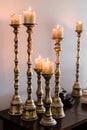 Candles In Brass Candlesticks