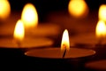 Burning candles with bright flames Royalty Free Stock Photo