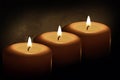 Candles burn in the dark Royalty Free Stock Photo