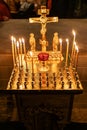 candles burn on funeral memorial table in church Royalty Free Stock Photo