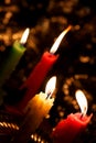 Candles burning in darkness Royalty Free Stock Photo