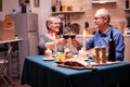 Candles burning on kitchen table Royalty Free Stock Photo