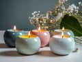 candles in ceramic houses. cozy relaxing lounge.