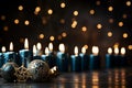 Candles and christmas balls on a blue background with bokeh 5 Royalty Free Stock Photo