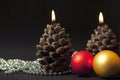 Candles with christmas-tree decorations