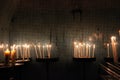 Candles in church on dark background