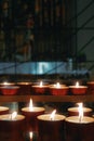 Candles in a church, light and fire Royalty Free Stock Photo