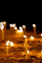 Candles in a church in memory of the dead and saints.