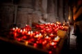 Candles in church picture with candles and prayer in temple fire as a symbol of purification through candle burning prayer for he