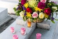 Candles and Flowers over Grave in The Annual Blessing of Graves at Ratchaburi Province, Thailand Royalty Free Stock Photo