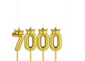 Candles form the number 7000 - Number of followers Royalty Free Stock Photo