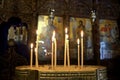 Candles in front of the iconostasis of the Greek Orthodox Church in Nazareth Royalty Free Stock Photo