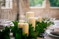 Candles and goblets on a decorated wedding table