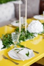 Candles and goblets on a decorated wedding table. selective focus