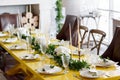 Candles and goblets on a decorated wedding table