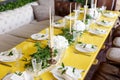 Candles and goblets on a decorated wedding table