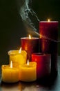 Candles and gray smoke Royalty Free Stock Photo