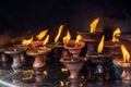 Candles for holy ceremony on the altar at the buddhist temple Royalty Free Stock Photo