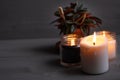 Candles. Home interior decoration. Romantic candles. White and black wax. In glass jars. Romantic atmosphere at home. Royalty Free Stock Photo