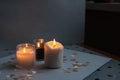 Candles. Home interior decoration. Romantic candles. White and black wax. In glass jars. Romantic atmosphere at home. Royalty Free Stock Photo