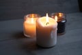 Candles. Home interior decoration. Romantic candles. White and black wax. In glass jars. Romantic atmosphere at home. Royalty Free Stock Photo