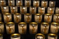 Candles with the image of the saint Maria inside the Notre Dame de Paris famous cathedral