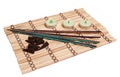 Candles, incense cones and sticks on bamboo mat Royalty Free Stock Photo