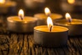 Candles light in advent. Christmas candles burning at night. Golden light of candle flame Royalty Free Stock Photo