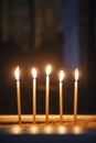 Candles light inside of historical ancient sight church of Saint Lazarus, Cyprus Royalty Free Stock Photo