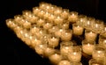 Candles lighting church and offering Royalty Free Stock Photo