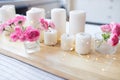Candles with lights. composition on the table. cute home decor with candles and flowers