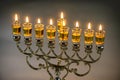 Candles lit for night of hanukkah with burning candles for holiday