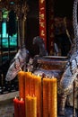 Candles lit on alter, Pagoda Chua Min Huong, Ho Chi Minh City