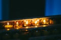 Candles lit in prayer in a church Royalty Free Stock Photo