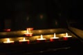 Candles lit red during a session of spiritualism. Concept of occultism