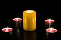 Candles are lit on the table, dark background Royalty Free Stock Photo