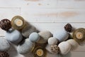 Candles and mineral pebbles for mindfulness or serenity, flat lay