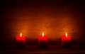 Candles on the old wooden background Royalty Free Stock Photo