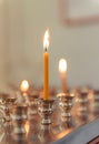 3 candles in an Orthodox church on a light Royalty Free Stock Photo