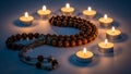 Candles and Prayer Beads Arrangement Royalty Free Stock Photo