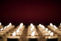 Candles on red background, all saints day concept Royalty Free Stock Photo