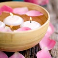 Candles and rose leaves Royalty Free Stock Photo