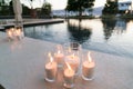 Candles are on the side of the pool Royalty Free Stock Photo