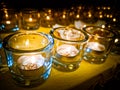 Candles in small little glasses during the vigil ceremony and prayer